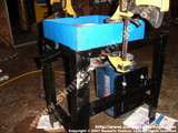 In May 2006 we water tested our belt drive version of the centrifuge. It was based on a table saw arbor. At 6900 RPM this machine does over 5000g. We used this for 6 months.