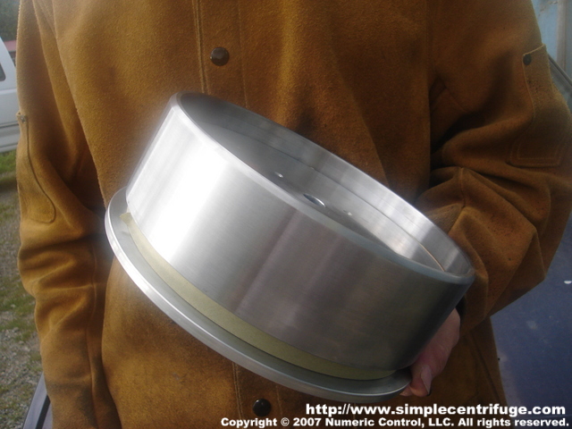 The rotor is then wrapped in paper to center the splash ring during welding.