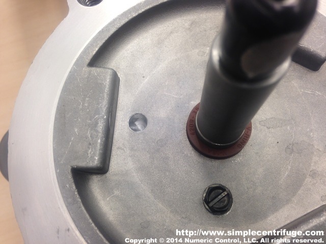 Install the forsheda seal on the motor shaft and compress it so it is about 3/16 of an inch high.