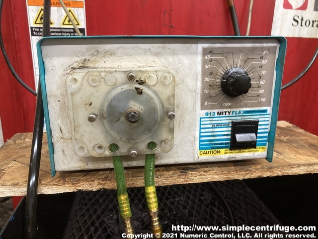 About 10 years ago I started experimenting with the use of a peristaltic pump. It worked really well but after a tube failure, and the subsequent spill, I gave up. Recently, I started using Tygon® F-4040-A tubing. So far it is working great. Note the containment, just in case.  