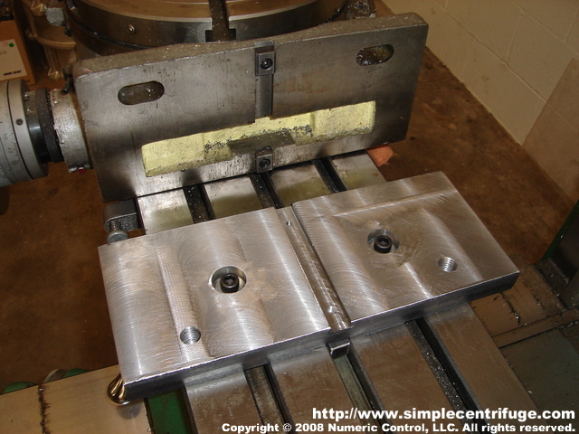 Because the casting are large we need a little more height in order to get a full swing out of the rotary table with the casting mounted. This is a 1 inch riser plate we whipped up. Simple but it works.