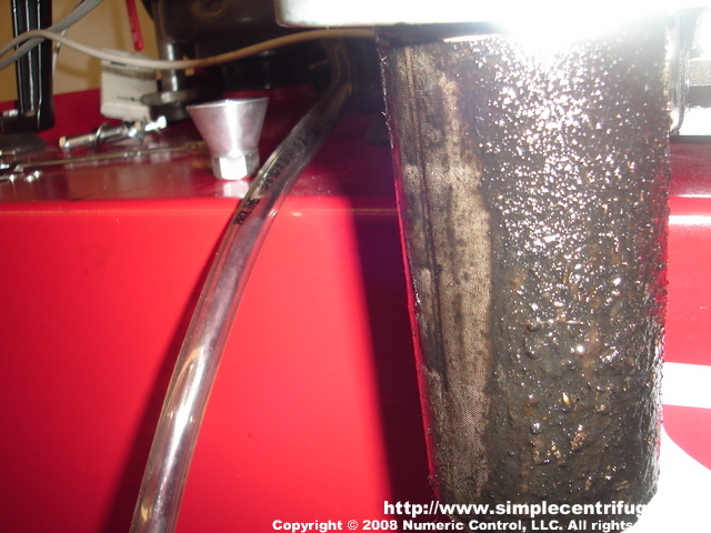 100 mesh screen filter in a Golden Rod housing. This acts as a water trap and catches the big chunks ahead of the centrifuge. The left side has been wiped clean and the right, by contrast, shows the dirt captured.