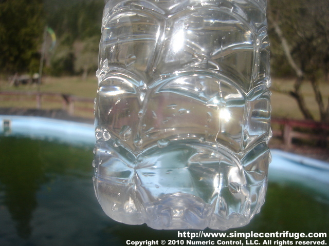 This is a sample from the pool. It looks drinkable. I can't see that it's full of algae. This has NOT been centrifuged. This is not like the high concentration from the earlier test.