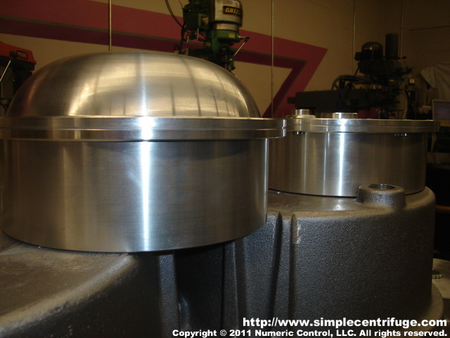 This photo shows the size comparison between the domed rotor and the flat rotor.