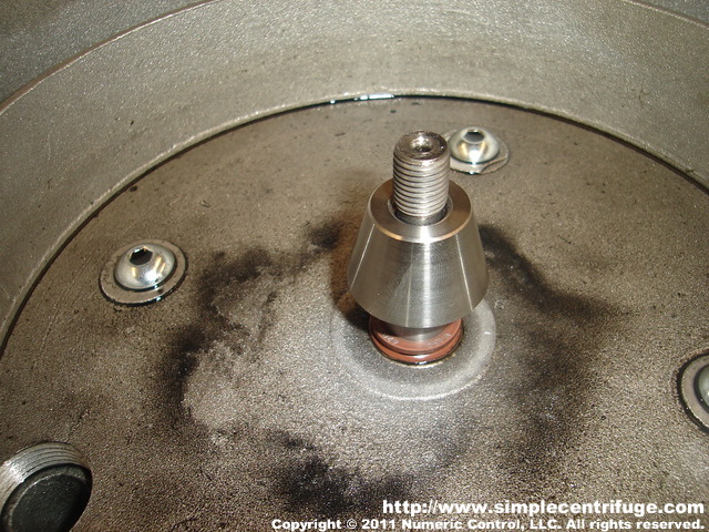 This is the stainless steel taper installed on the motor shaft. The rotor rides on the taper and a custom nut/bolt combination in the rotor hold the rotor in place during operation.