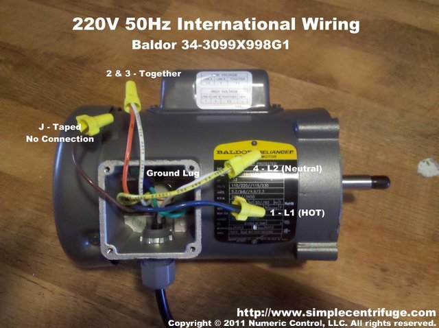 Wiring for Baldor 34-3099X998G1 motor that is typically shipped overseas for 50 Hz operation.
Hot is Blue, Nuetral is Yellow, Earth is green lug on chassis.