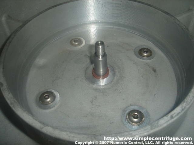 Water testing the seal. The seal is a Forsheda V-ring that rotates with the motor shaft. When the machine is running the seal slings the oil away from the shaft. When stopped the lip seals the shaft. The seal passed our water test perfectly.