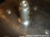 A length of pipe is cut to hold the hub tight during welding.