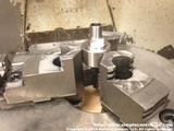 After the operations on the lathe the stainless steel part is moved to the mill and a square is milled into it.
