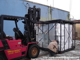 De-crating the new machine. Yeah that's snow on the ground.