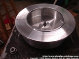 After the machined collar is tight then the bowl is place on the shaft. Note that the bowl is slightly higher than the top of the shaft, this allows the nut to make full contact.