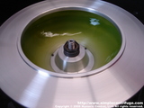 As the centrifuge slows much of the algae remixes with the water in the bowl.