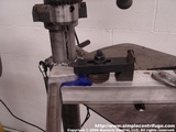 Toe drilling fixture for the centrifuge leg.