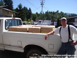 Mike with a load of centrifuges. The shipping company didn't have room for our entire load so Mike had to take these to the depot himself.