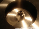 Stainless steel machined nut and a machined flat shoulder for it to snug down to. Not only does it improve the bowls balance but it also makes the bowl easier to remove. Beginning 06/26/07 all bowls will ship with this hub configuration.  